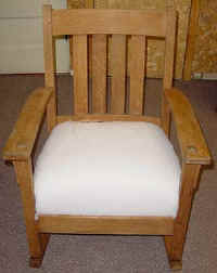 Oak Mission Style Rocking Chair stripped and the seat repaired.