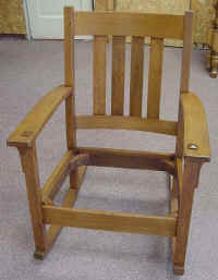 Oak Mission Style Rocking Chair stained and finished with satin lacquer.