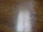  Formica table top close up that was scratched and crazed.