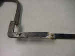A broken counter weight hinge.