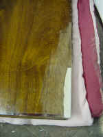 Then it's sanded and textured to give it the grainy feel and look.